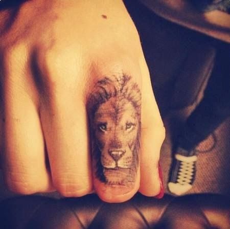 Leo Symbol Tattoo on Index Finger for Girls